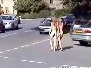 Two mischievous blondes running naked in the public park