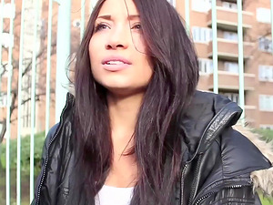 Brunette girlfriend moans while being pleasured in public